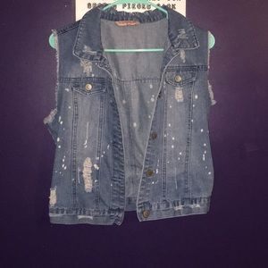 Distressed denim vest